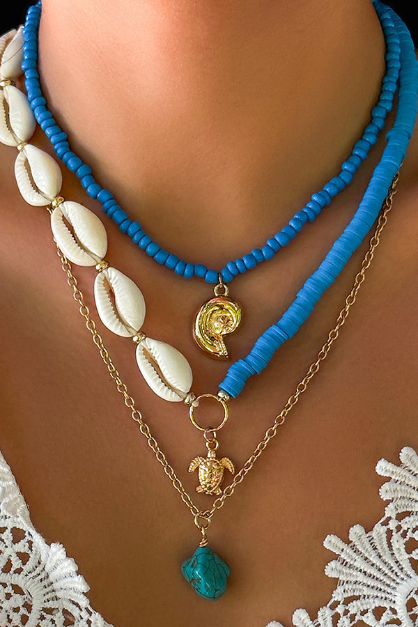 Collier multicouche avec perles et coquillages