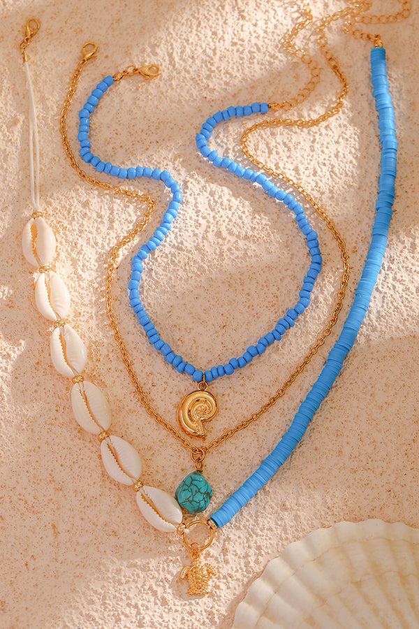 Collier multicouche avec perles et coquillages