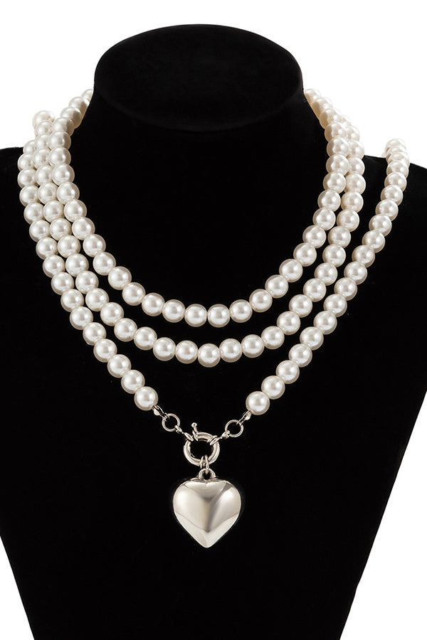 Collier multi-couches cœur et perles élégant