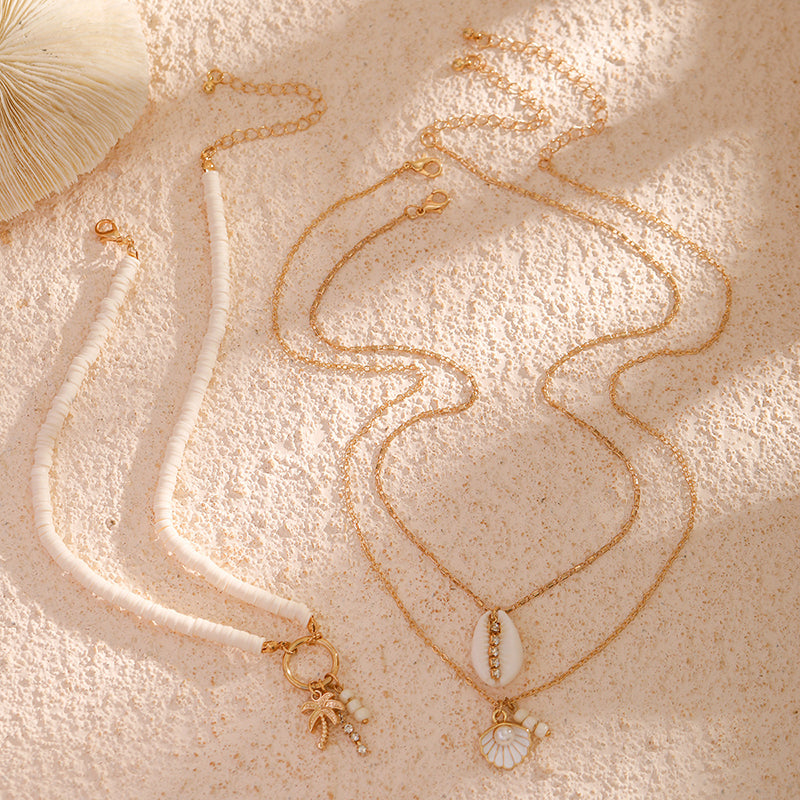 Collier multicouche avec perles et coquillages