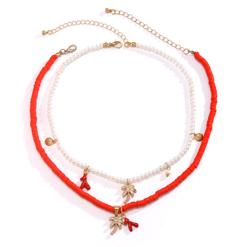 Collier multicouche avec perles et coquillages