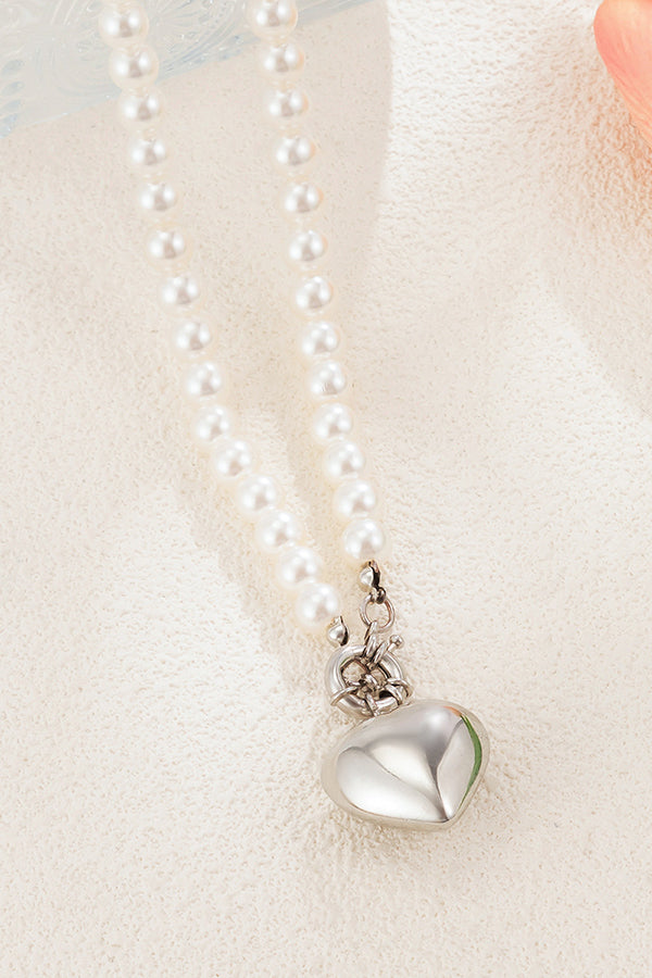 Collier multi-couches cœur et perles élégant