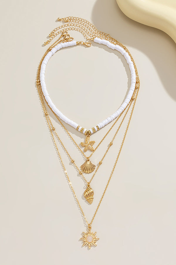 Collier multicouche avec perles et coquillages