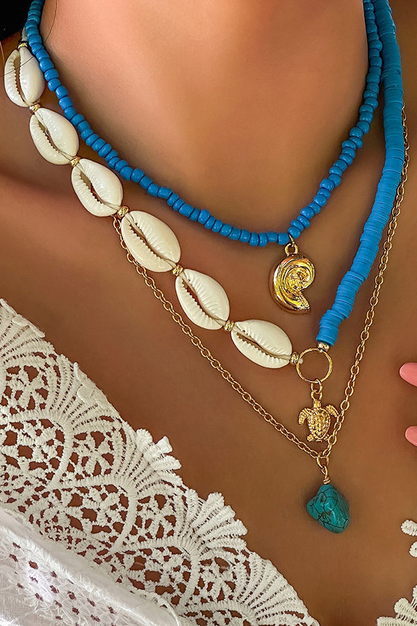 Collier multicouche avec perles et coquillages