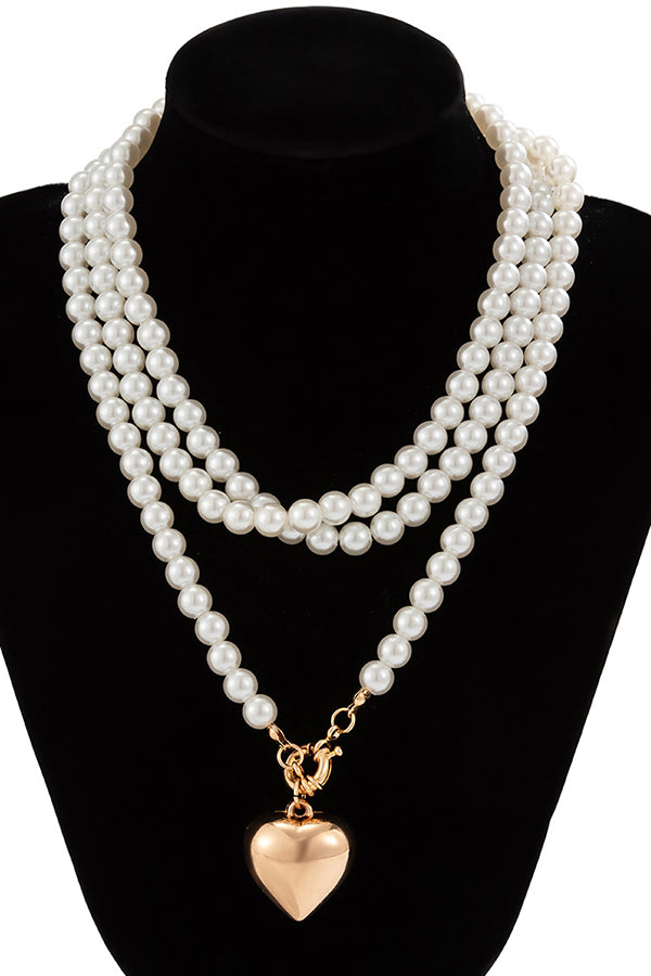 Collier multi-couches cœur et perles élégant