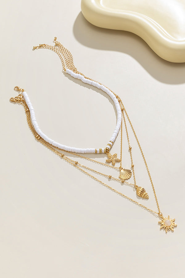 Collier multicouche avec perles et coquillages